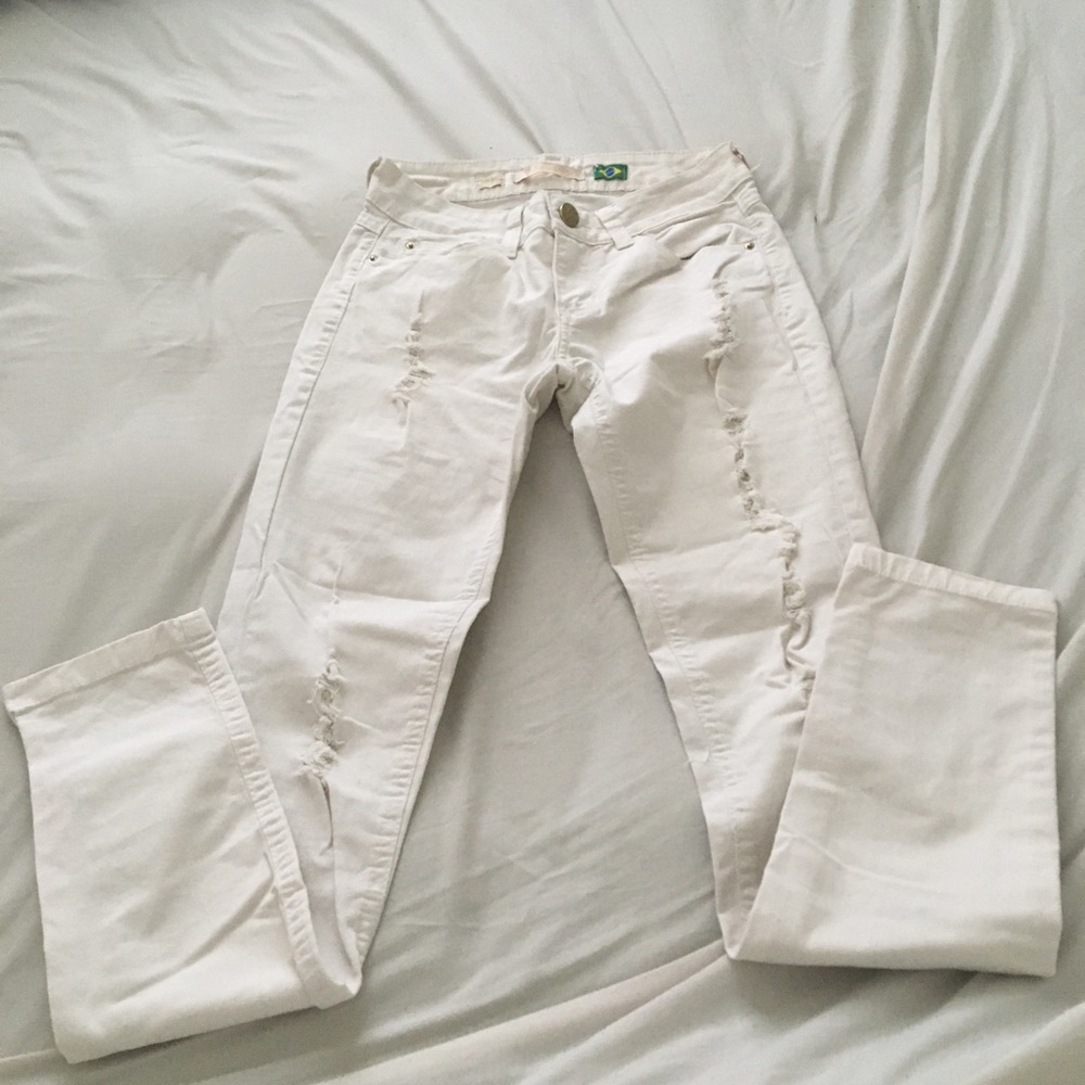 White ripped pants
